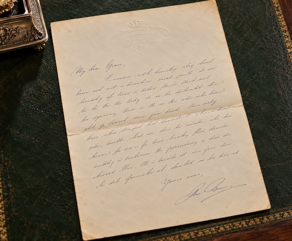 Antique handwritten letter on aged cream paper
