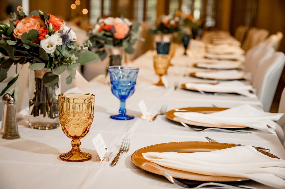 a table set with plates and glasses