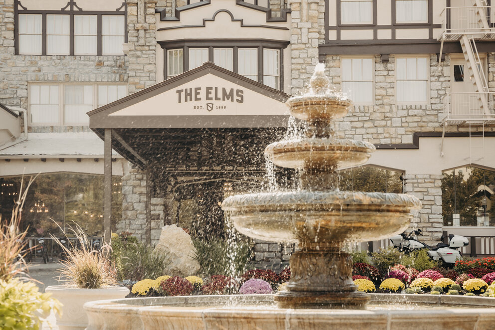 a water fountain in front of a building