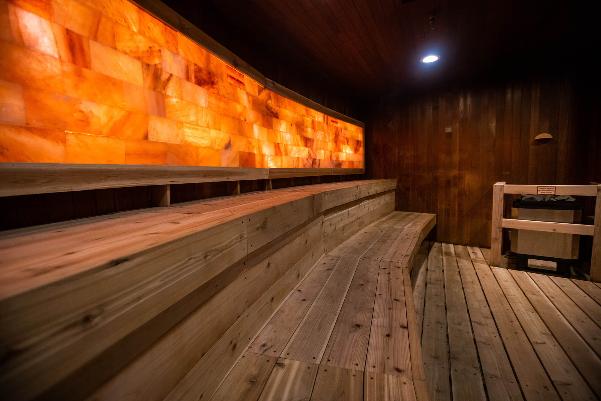 a wooden bench in a room