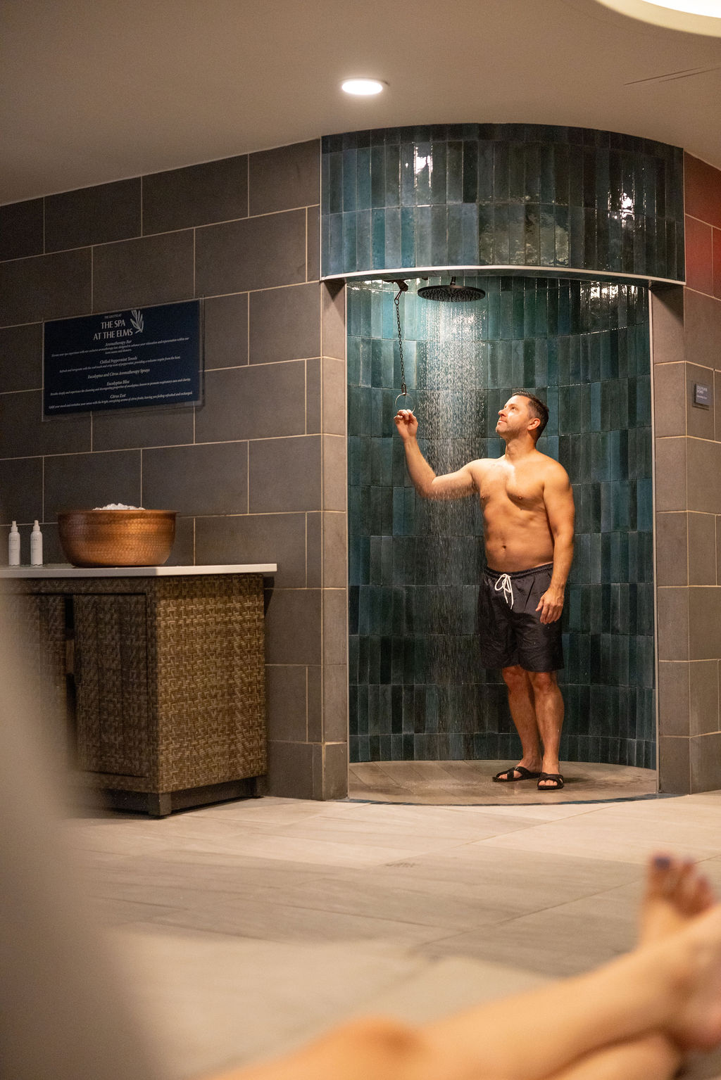 a man standing in a shower
