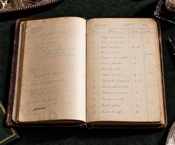 Open antique dinner ledger.
